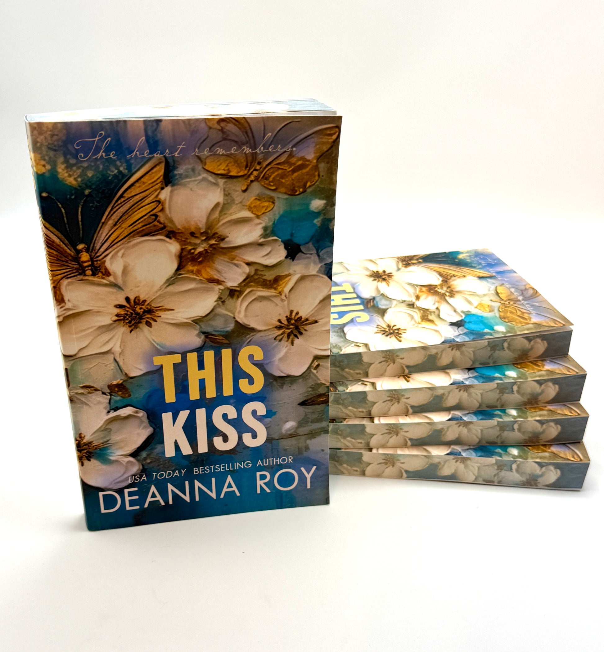 This Kiss stack of books
