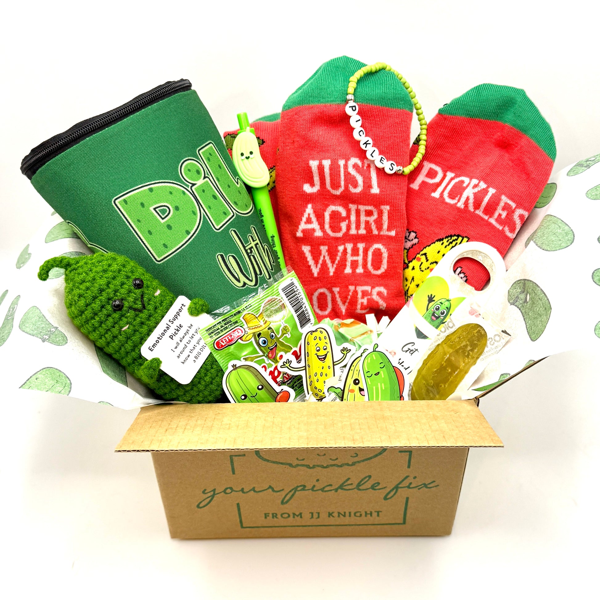 Pickle themed gift box with socks, bead bracelet, stuffed pickle, pouch, bottle opener and more at Love Story Box