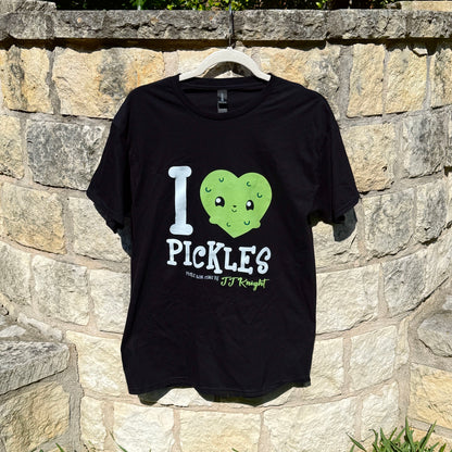 Black t-shirt with 'I ❤️ Pickles' design on a stone wall background