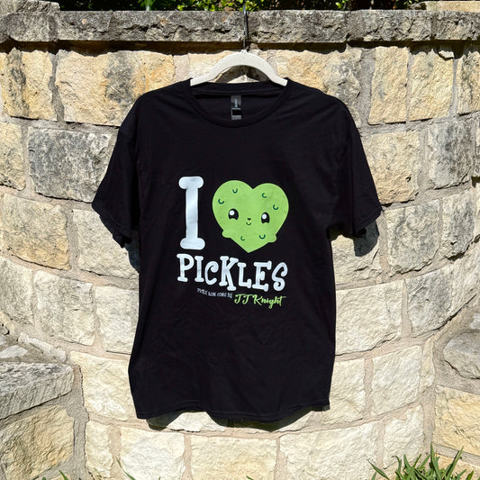 Black t-shirt with 'I ❤️ Pickles' design on a stone wall background