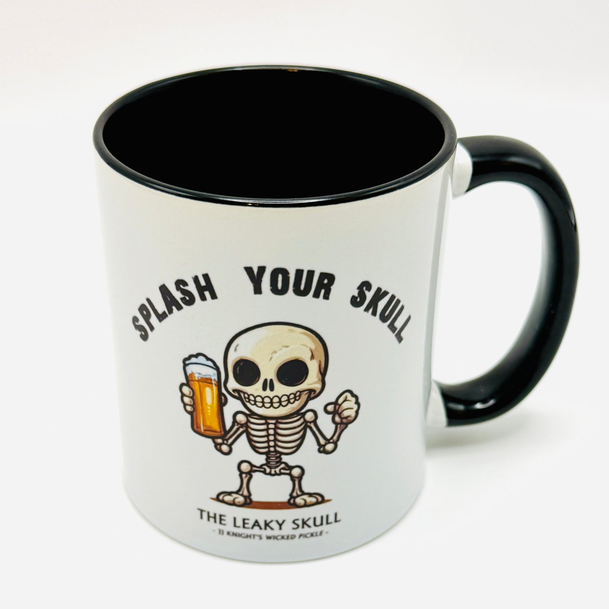 Mug with a skeleton design and text 'Splash Your Skull' on a white background